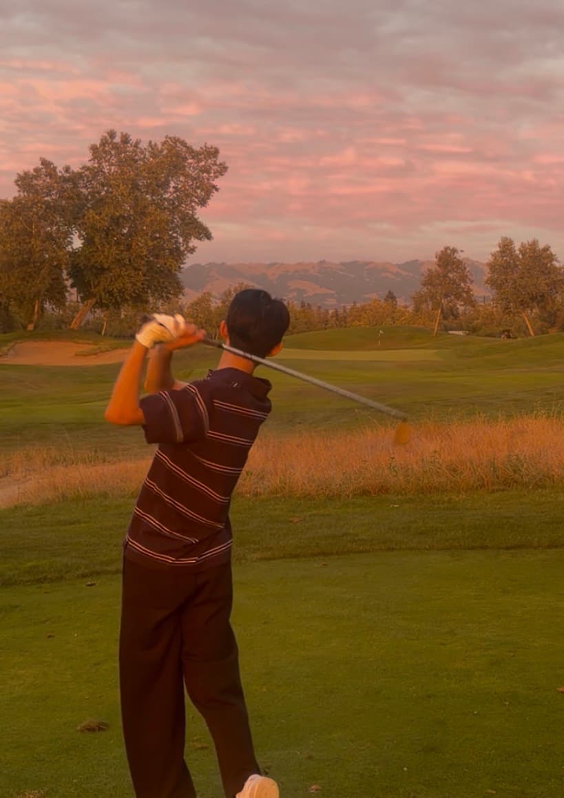 A sunset swing on the golf course